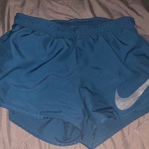 Blue Nike shorts